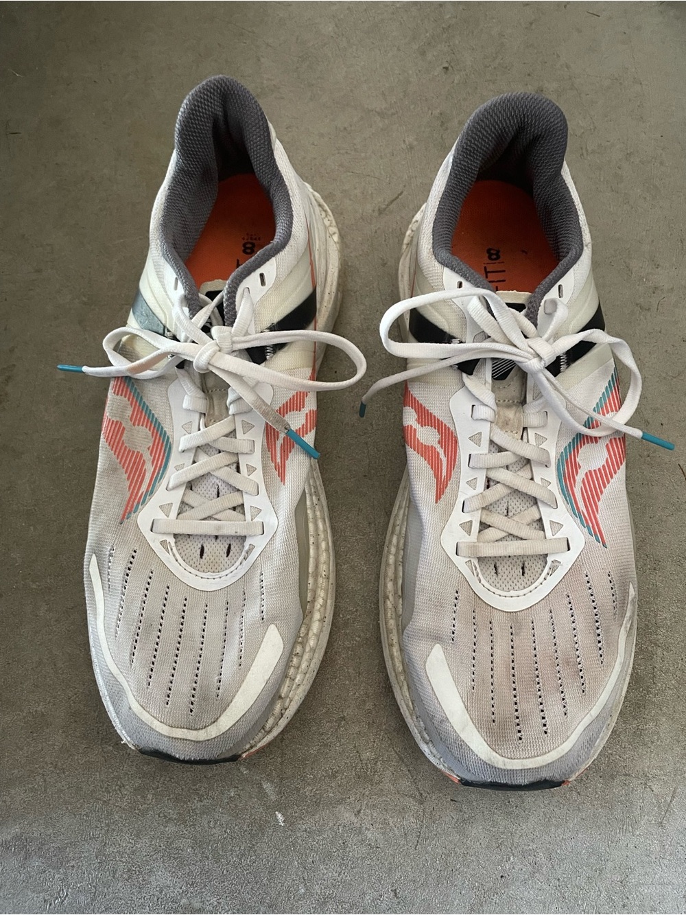 Saucony White Running Shoes with Coral & Teal Accents
